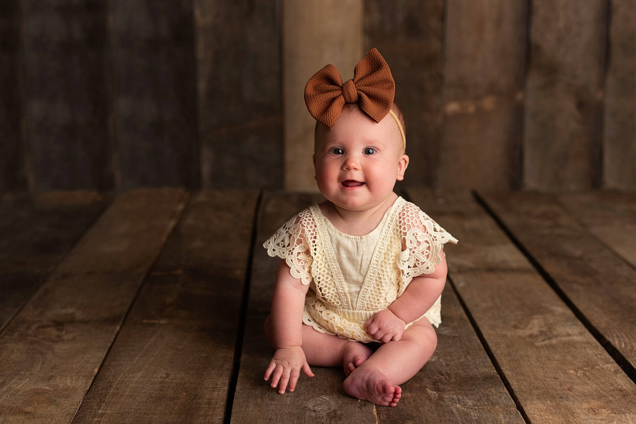 Kambrie is registered to the contest to win money with this photo: baby, baby_toddler_clothing, child, dress, face, flash_photography, floor, flooring, fun, grass, happy, hardwood, joy, person, pink, sitting, skin, sleeve, smile, toddler