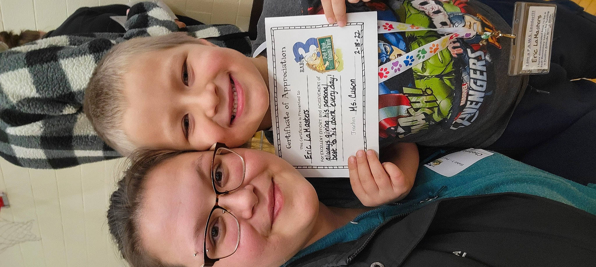 Eric is registered to the contest to win money with this photo: automotive_tire, cheek, event, eyebrow, eyelash, finger, forehead, fun, gesture, glasses, hairstyle, happy, joy, mouth, nail, nose, person, publication, smile, social_group
