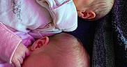 Chargeralan joined the competition — help win amazing prizes! newborn, twins, babies, sleeping, infants, portrait, closeup, pink_clothing, white_clothing, onesies, blanket, cozy, peaceful, faces, heads, eyes_closed, indoors, cuddling, family, soft_lighting