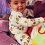 Lizzierae is registered to the contest to win money with this photo: baby, balloon, clothing, couch, cushion, face, furniture, happy, hat, head, homedecor, indoors, laughing, pajamas, person, photography, portrait, quilt, sitting, smile