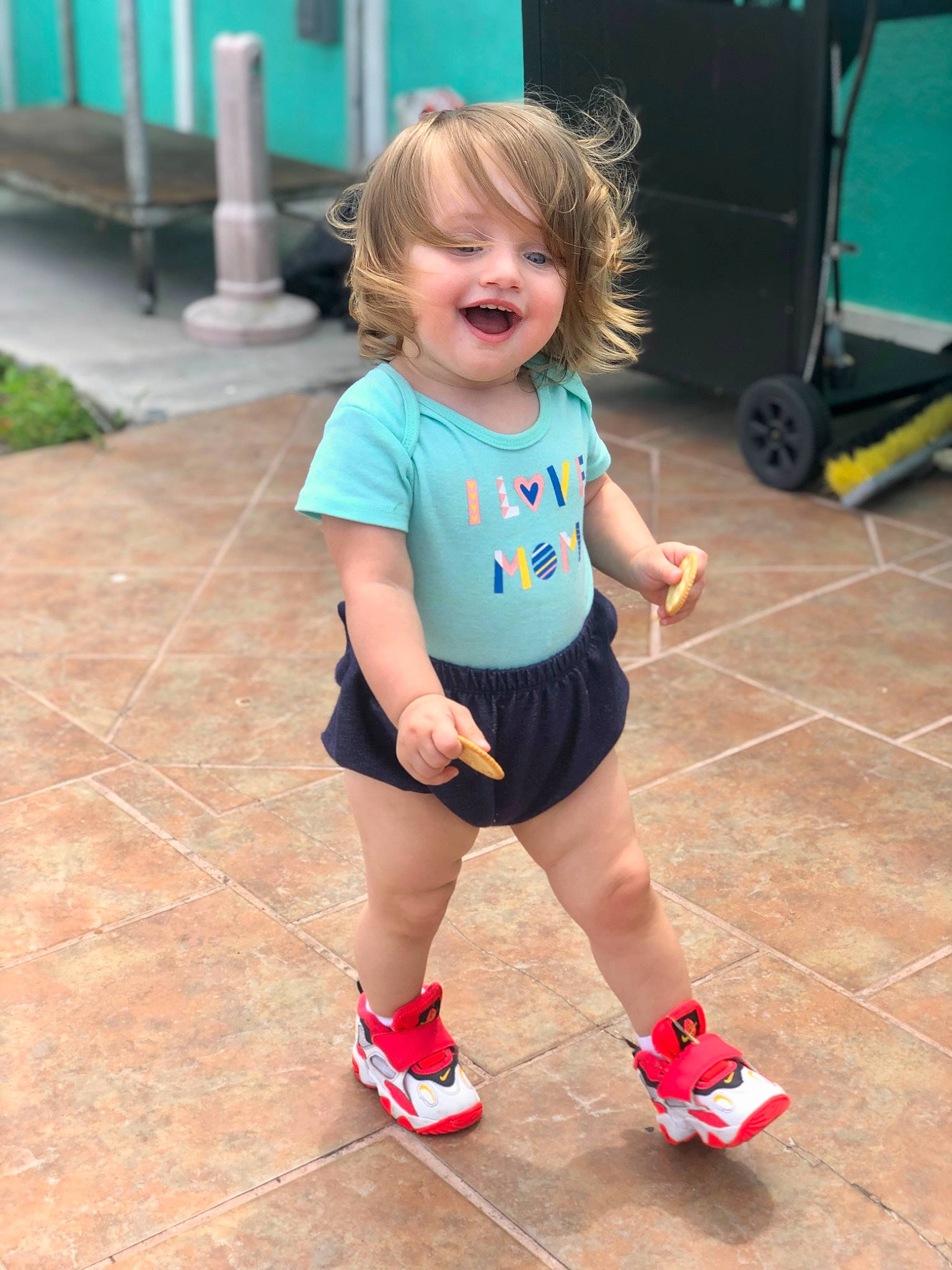 Scarlett is registered to the contest to win money with this photo: baby_toddler_clothing, child, fun, green, happy, joint, knee, leisure, person, photograph, pink, shorts, sleeve, smile, snapshot, standing, summer, t_shirt, thigh, toddler