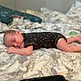 Trenton joined the competition — help win amazing prizes! baby, infant, bed, blanket, onesie, sleeping, face, skin, foot, hand, diaper, pattern, marble, fabric, relaxing, cute, indoors, person, child, comfort