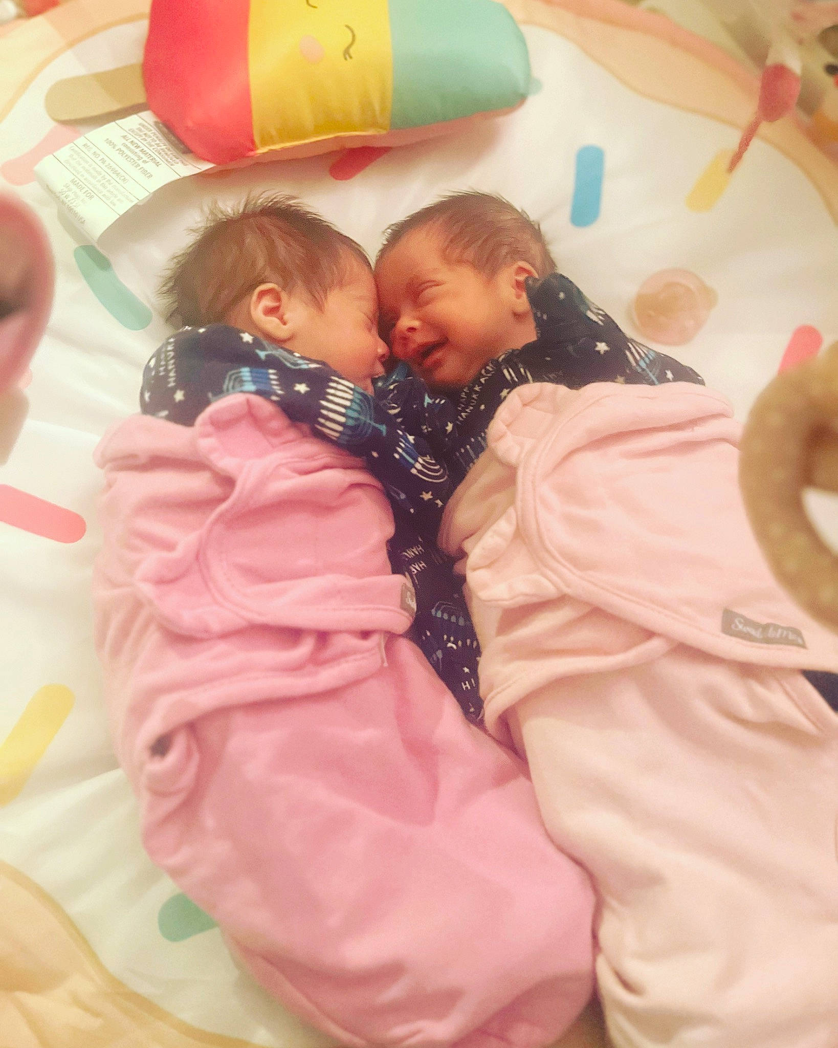 Amelia And Aspen is registered to the contest to win money with this photo: baby, baby_toddler_clothing, child, comfort, event, finger, fun, gesture, happy, leisure, linens, magenta, party, person, pink, play, room, skin, smile, toddler