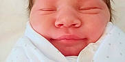 Genesis joined the competition — help win amazing prizes! newborn, baby, swaddled, blanket, sleeping, face, infant, cute, soft, skin, peaceful, portrait, indoors, human, child, head, closeup, adorable, wrapped, resting