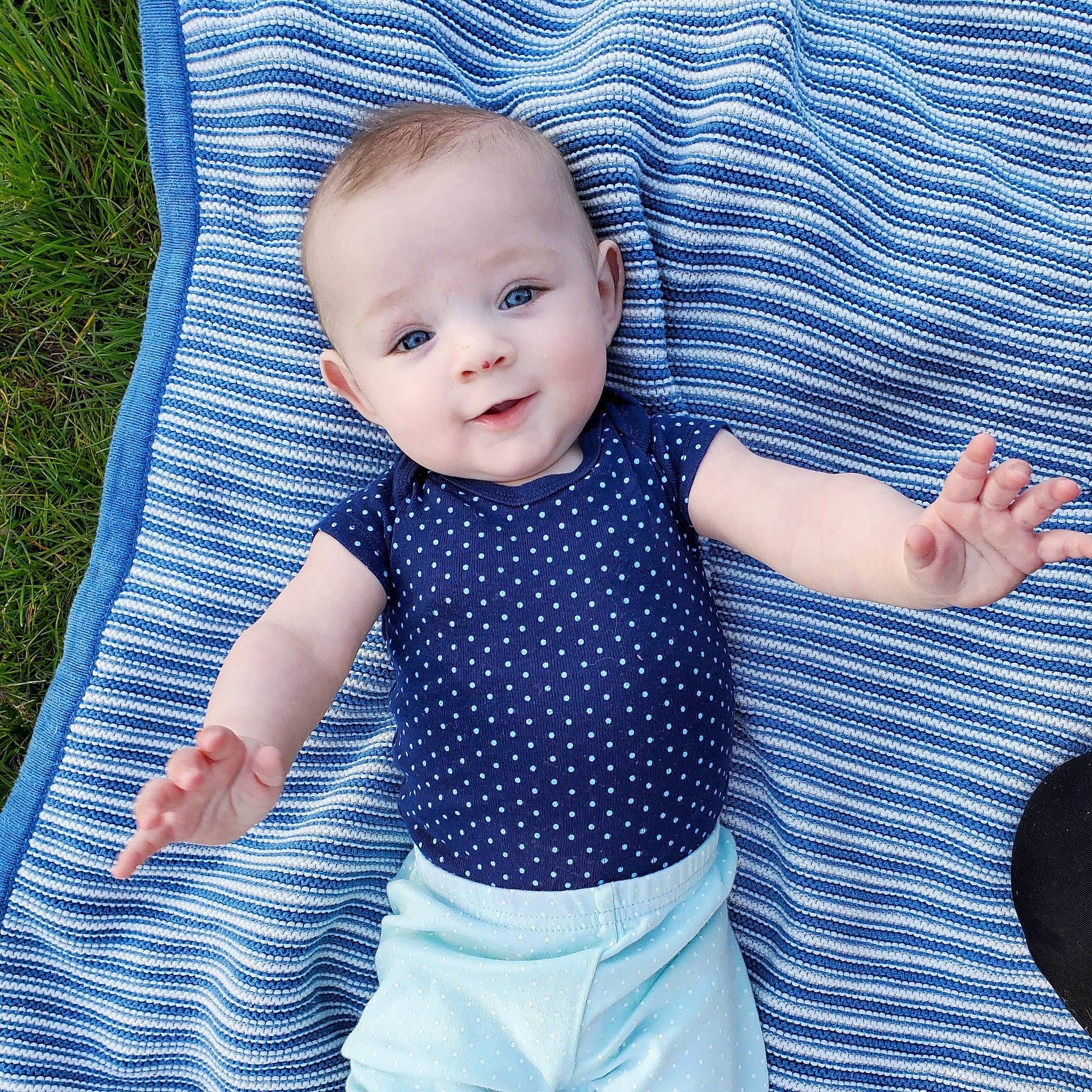 Kimberly is registered to the contest to win money with this photo: aqua, azure, baby, baby_toddler_clothing, blue, collar, cool, eye, facial_expression, finger, gesture, hairstyle, hand, happy, iris, person, product, skin, sleeve, standing