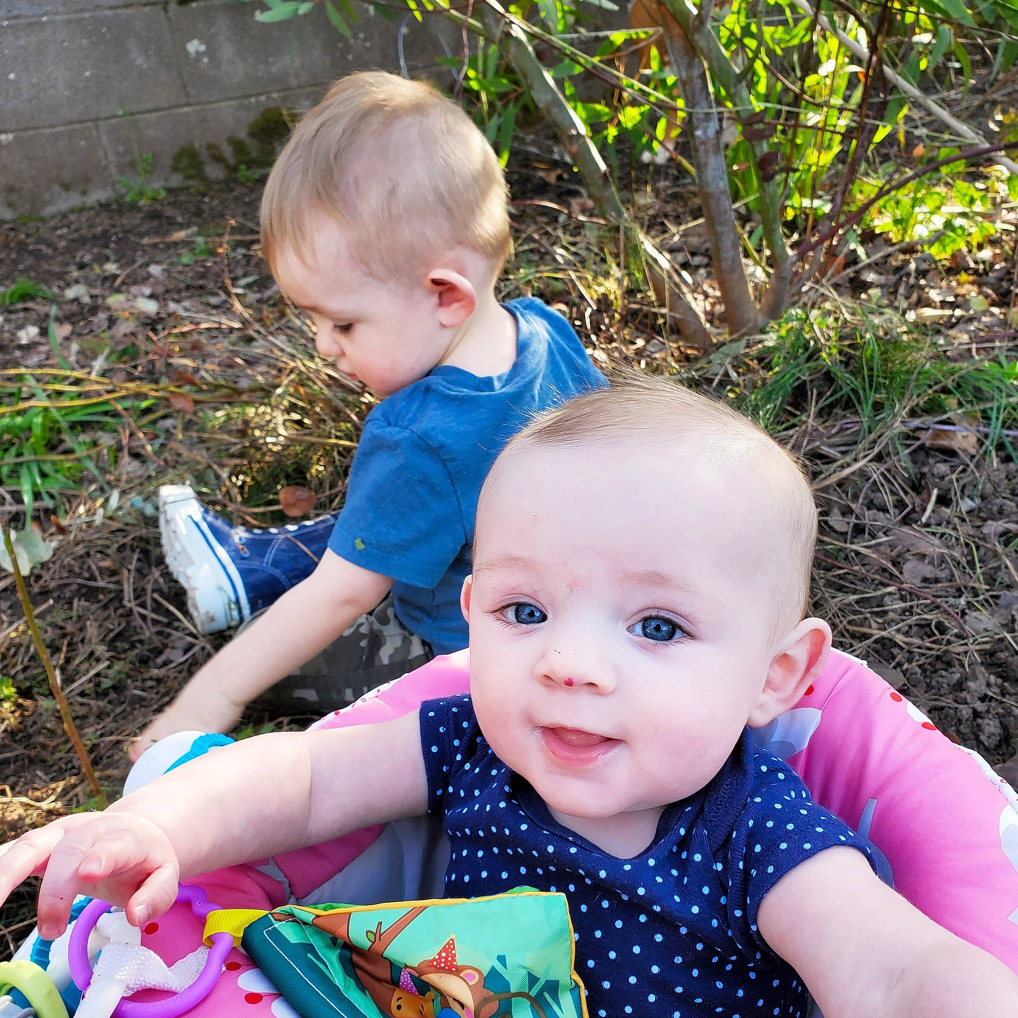 Kimberly joined the competition — help win amazing prizes! baby, baby_toddler_clothing, child, grass, green, happy, iris, leaf, mammal, people, people_in_nature, person, photograph, plant, sitting, sleeve, smile, summer, t_shirt, toddler