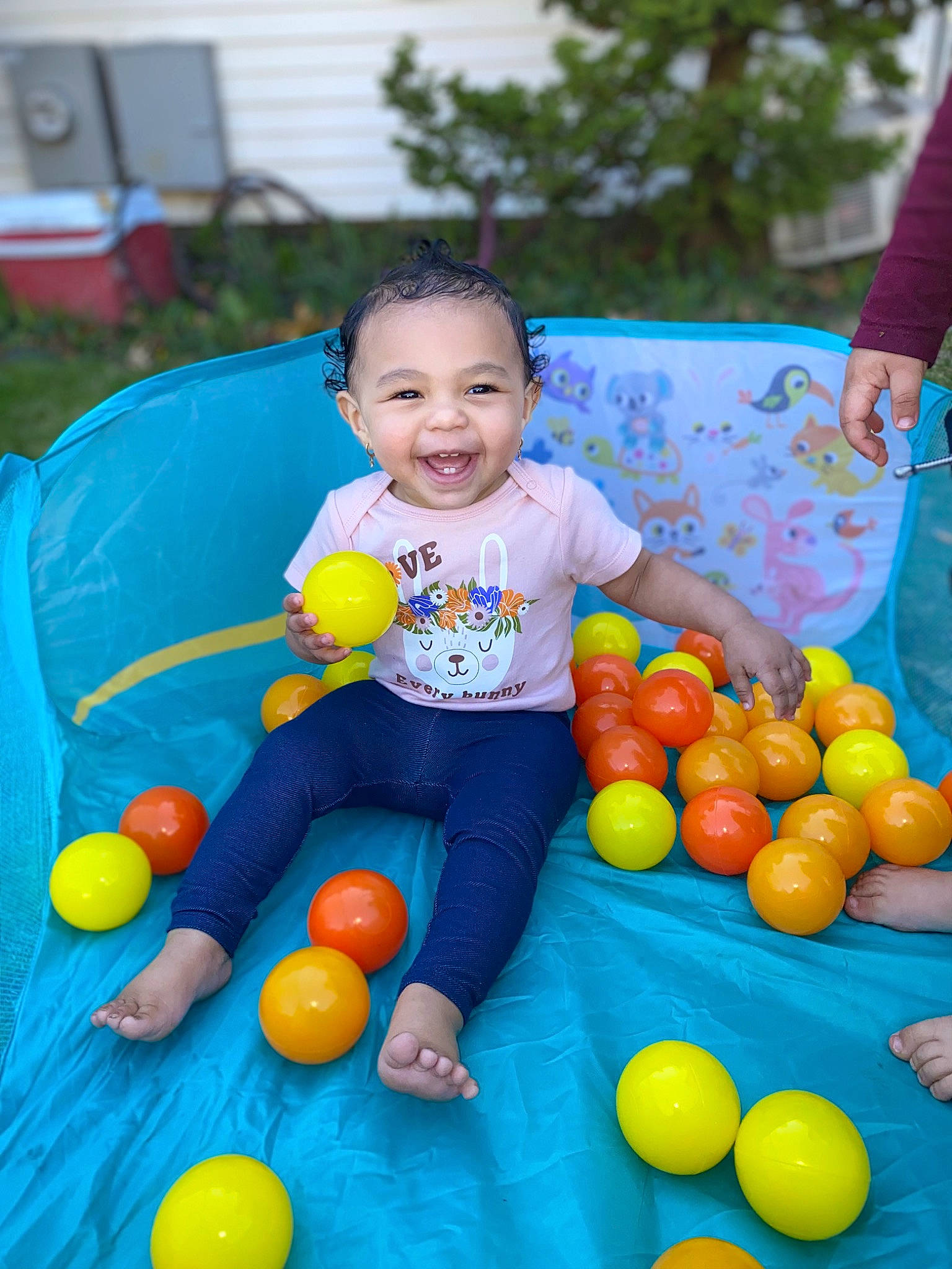 Arabelle is registered to the contest to win money with this photo: ball, child, community, face, facial_expression, fun, grass, happy, human_settlement, joy, leisure, people, person, photograph, plant, product, public_space, recreation, smile, snapshot