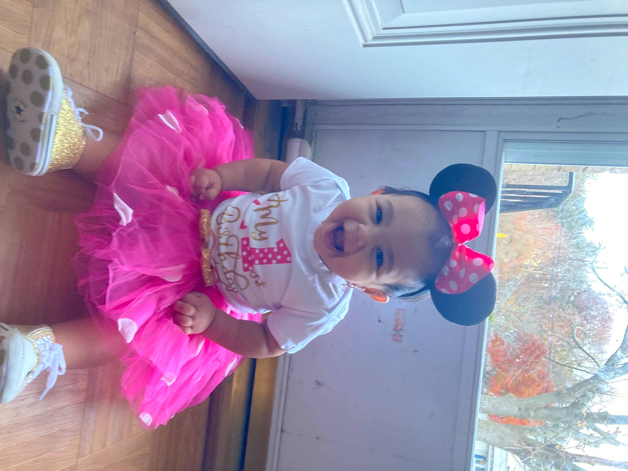 Arabelle is registered to the contest to win money with this photo: baby, baby_toddler_clothing, blue, child, fun, happy, hat, leisure, magenta, mammal, person, pink, plant, purple, skin, smile, snapshot, toddler, violet, window