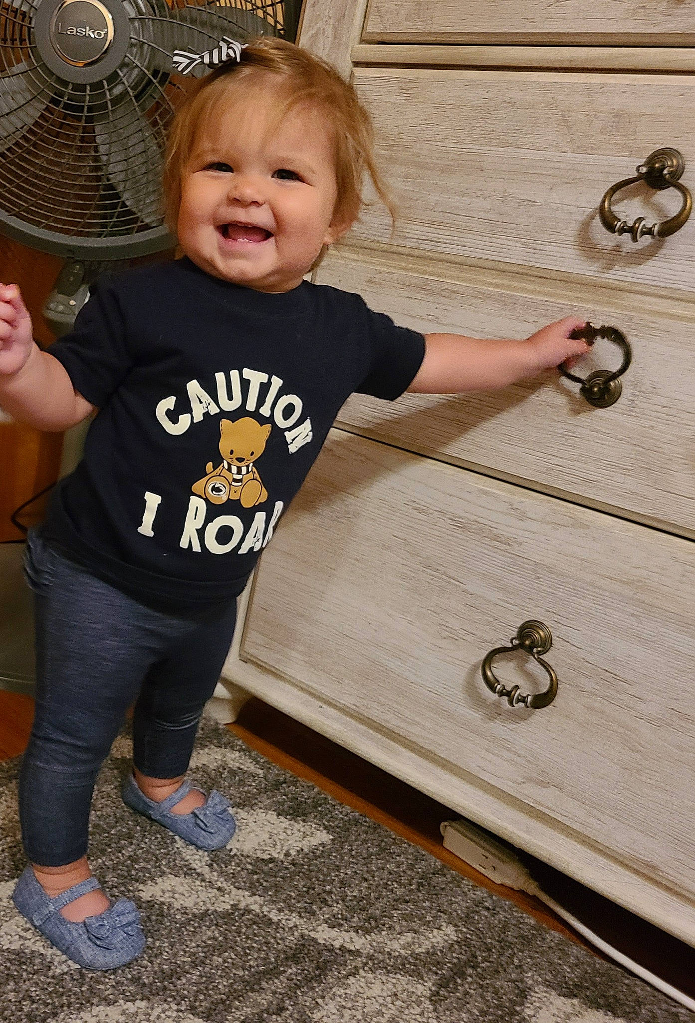 Sophia joined the competition — help win amazing prizes! baby, baby_toddler_clothing, child, eye, fashion_accessory, floor, flooring, fun, happy, joy, mechanical_fan, pattern, people, person, play, sleeve, smile, standing, t_shirt, toddler