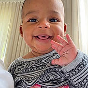 Ahnemaiuz joined the competition — help win amazing prizes! baby, child, closeup, curtains, cute, expression, face, fingernails, hand, happy, holding, indoor, nails, patterned_clothing, person, portrait, skin, smiling, warm_light, young_child