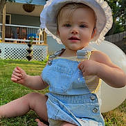 Olivia joined the competition — help win amazing prizes! toddler, child, grass, balloon, hat, denim, overalls, outdoor, sunlight, smiling, baby, nature, greenery, porch, house, summer, cute, sitting, daylight, playful