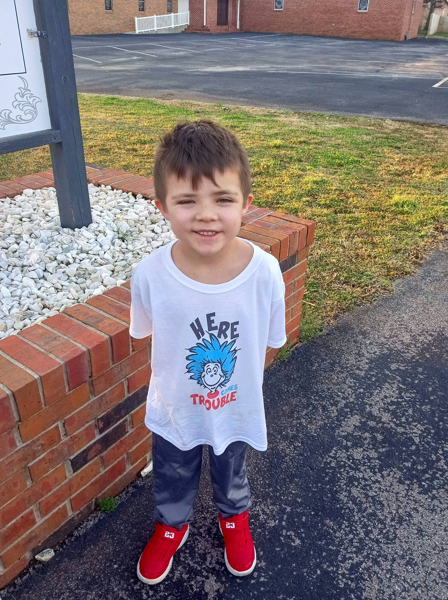 Zaxdon is registered to the contest to win money with this photo: asphalt, baby_toddler_clothing, child, concrete, eye, fun, grass, happy, head, joy, lawn, leaf, leisure, mammal, person, recreation, sleeve, smile, standing, t_shirt