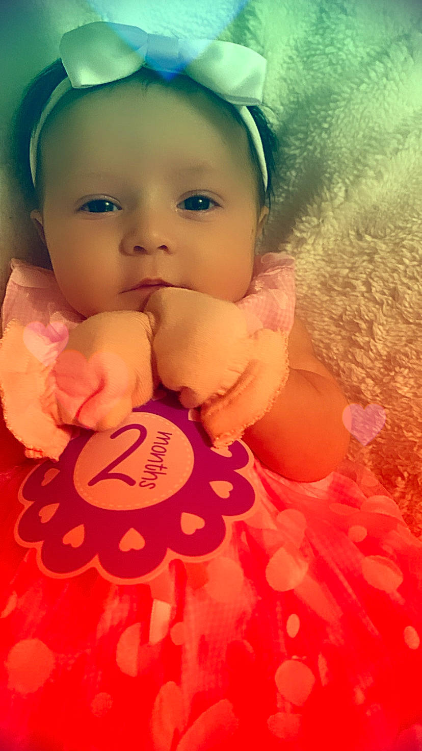 Zayleigh joined the competition — help win amazing prizes! baby, baby_toddler_clothing, beauty, cheek, dress, event, fun, gesture, hand, happy, head, headwear, lip, nail, nose, orange, peach, person, petal, pink