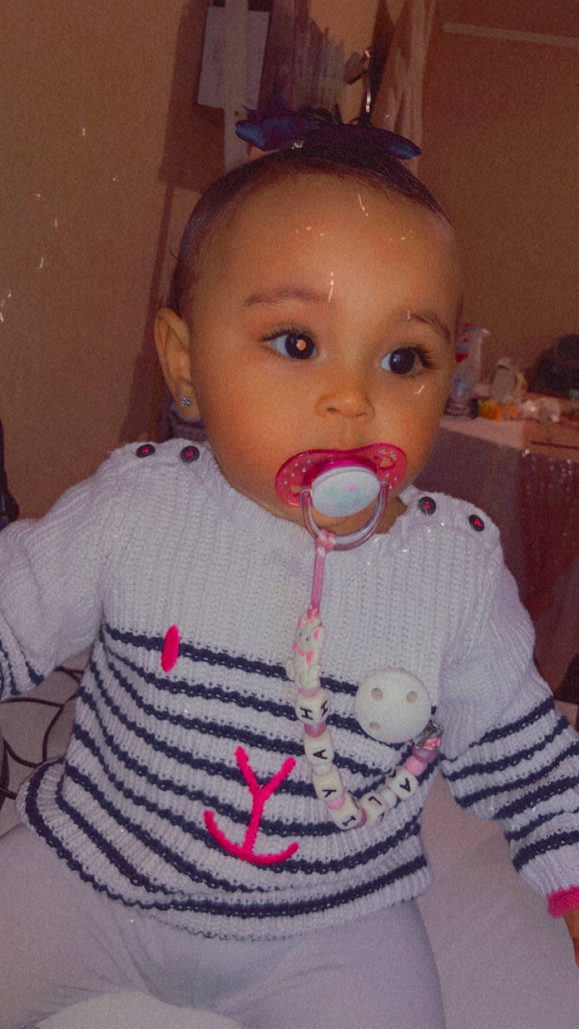 Aliyah a rejoint le concours — aidez-le/la à gagner de superbes lots ! baby, baby_toddler_clothing, cheek, child, chin, creative_arts, eyebrow, eyelash, forehead, iris, jacket, lip, nose, pattern, person, pink, skin, sleeve, toddler, wool