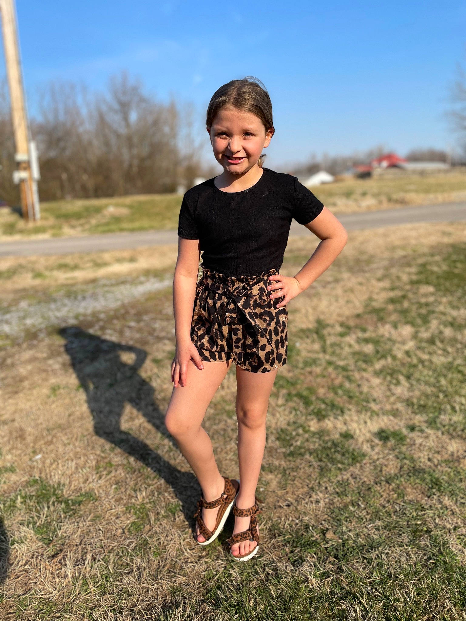 Aubrey joined the competition — help win amazing prizes! barefoot, flash_photography, grass, grass_family, grassland, happy, joy, knee, landscape, leg, leisure, people_in_nature, person, sky, sleeve, standing, street_fashion, sunlight, t_shirt, thigh