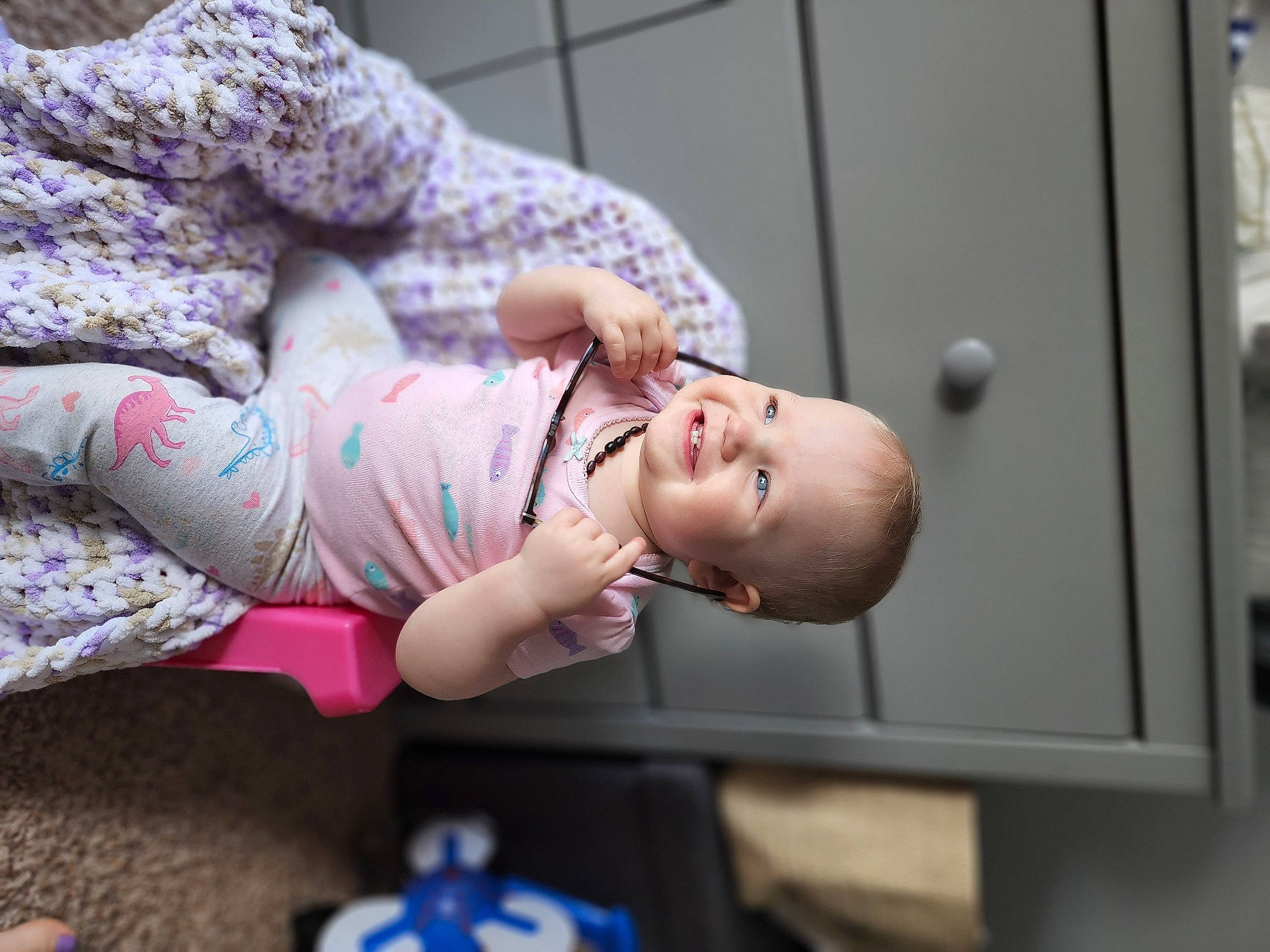 Fiona joined the competition — help win amazing prizes! baby, baby_products, baby_toddler_clothing, child, comfort, fun, happy, head, human_body, joy, person, portrait_photography, room, sitting, skin, sleeve, toddler, tree, vacation, wood