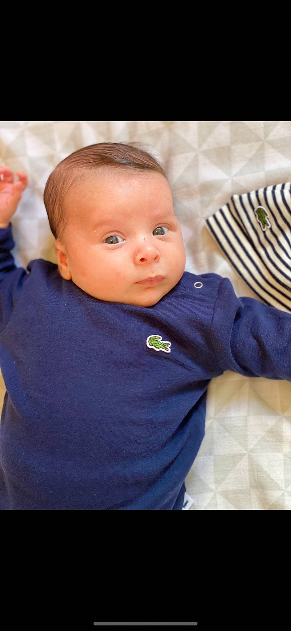 Keyan participe au concours pour gagner de l'argent avec cette photo : baby, baby_toddler_clothing, cheek, child, collar, comfort, electric_blue, eyebrow, eyelash, flash_photography, fun, happy, iris, lip, nose, person, sitting, skin, sleeve, t_shirt