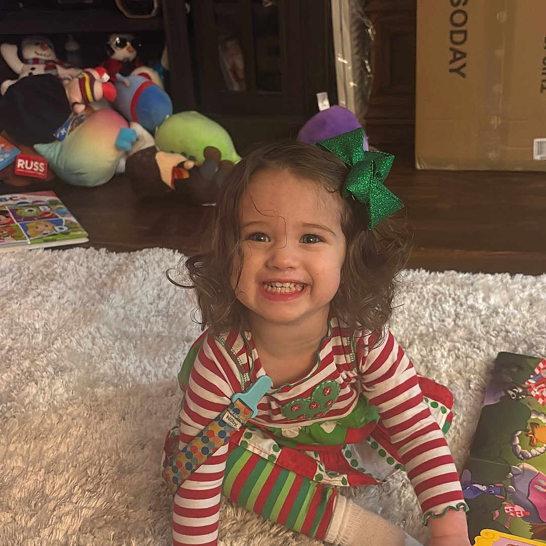 Lunavi is registered to the contest to win money with this photo: architecture, baby, bodypart, building, child, face, female, finger, furniture, girl, hand, head, helmet, indoors, livingroom, person, photography, portrait, shelf, sphere