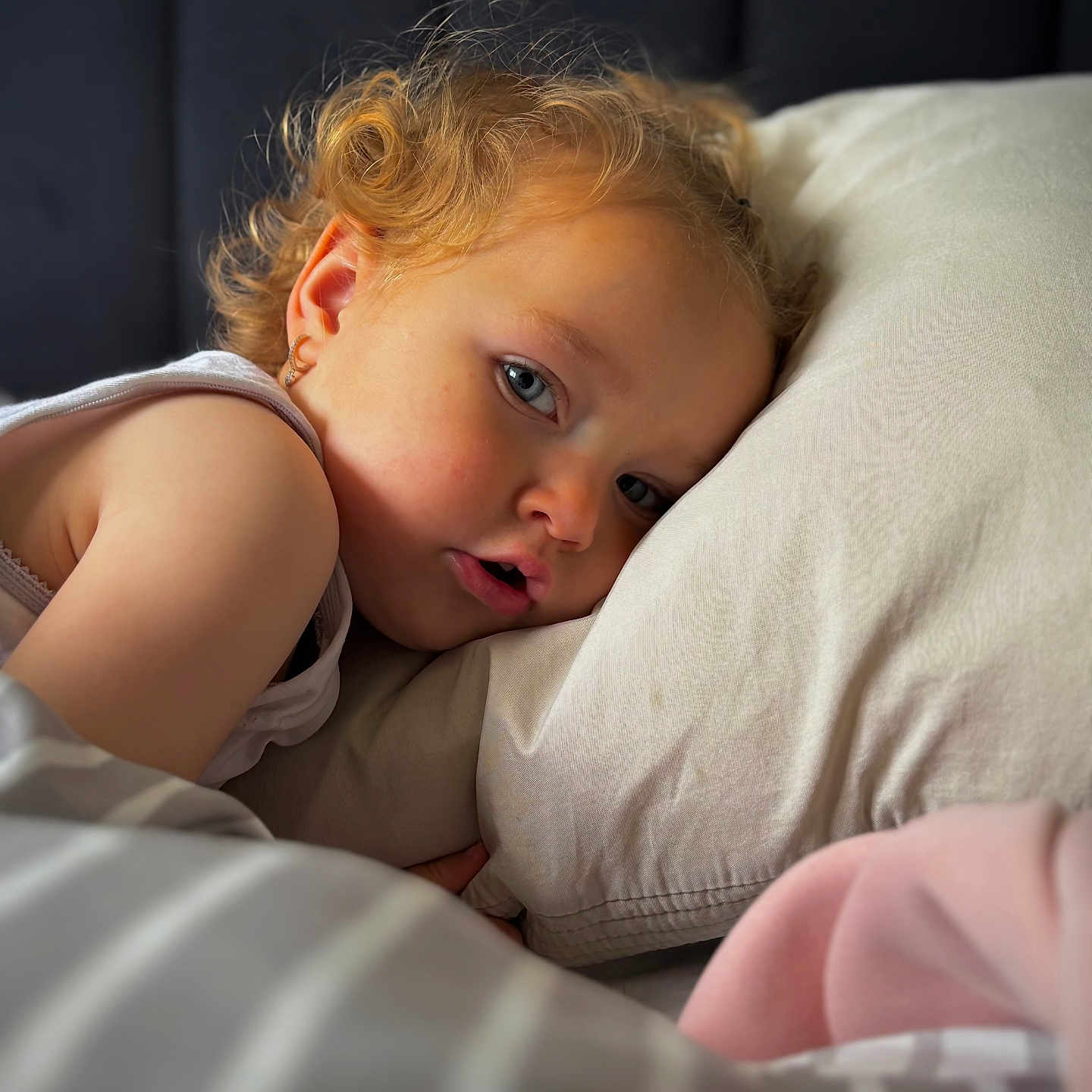 Ariellah-Rose joined the competition — help win amazing prizes! bed, blanket, child, close_up, comfort, curly_hair, earring, eyelashes, face, indoor, peaceful, person, pillow, relaxation, resting, skin, sleepy, soft_light, toddler, young_child