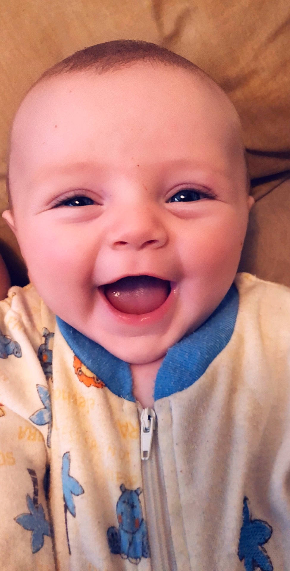 Mathias is registered to the contest to win money with this photo: boy, cheek, child, chin, close_up, eye, eyebrow, face, facial_expression, forehead, head, infant, laughter, lip, mouth, nose, person, skin, smile, toddler