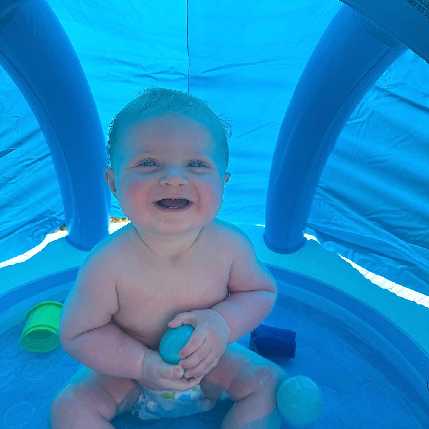 Harrison joined the competition — help win amazing prizes! amusementpark, baby, bodypart, face, finger, hand, happy, head, inflatable, laughing, outdoors, person, photography, pool, portrait, smile, summer, swimmingpool, water, waterpark