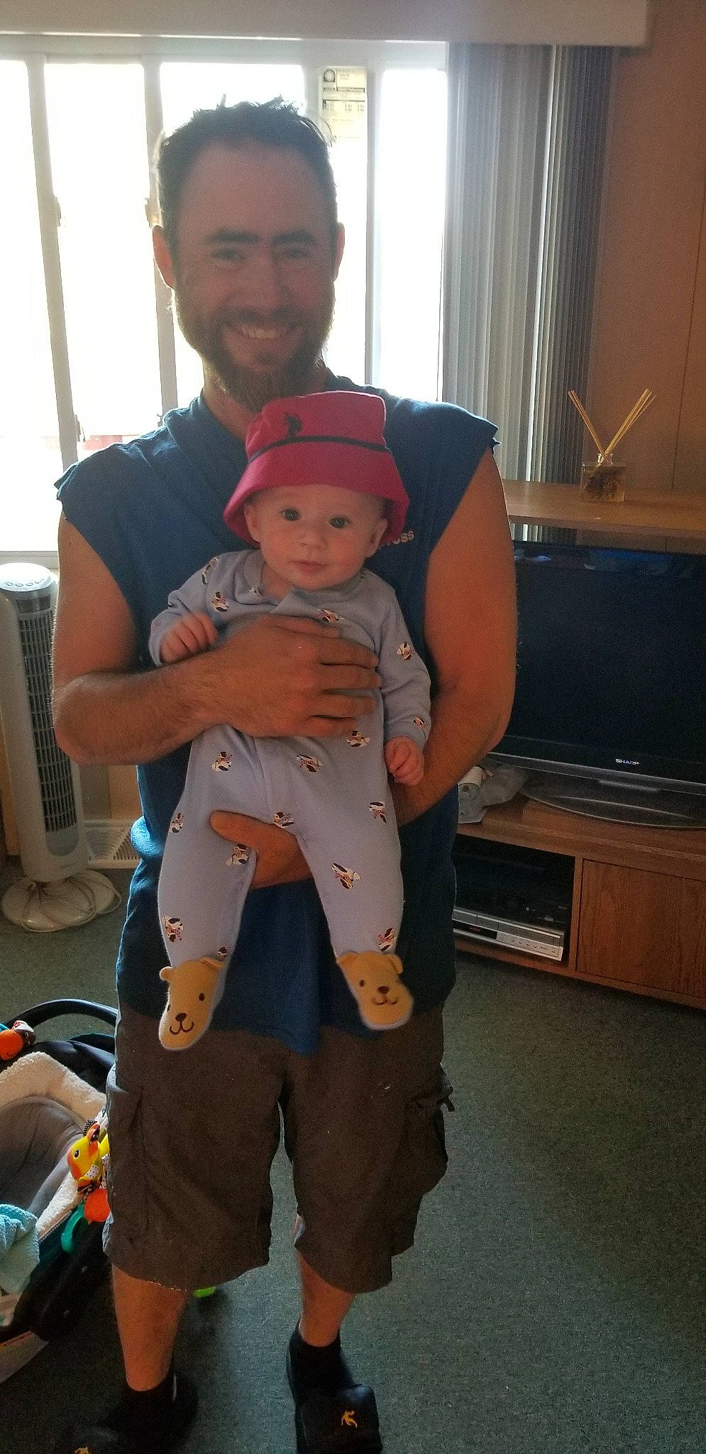 Geoffrey is registered to the contest to win money with this photo: arm, baby, baby_products, child, joy, person, product, shoulder, skin, standing, toddler