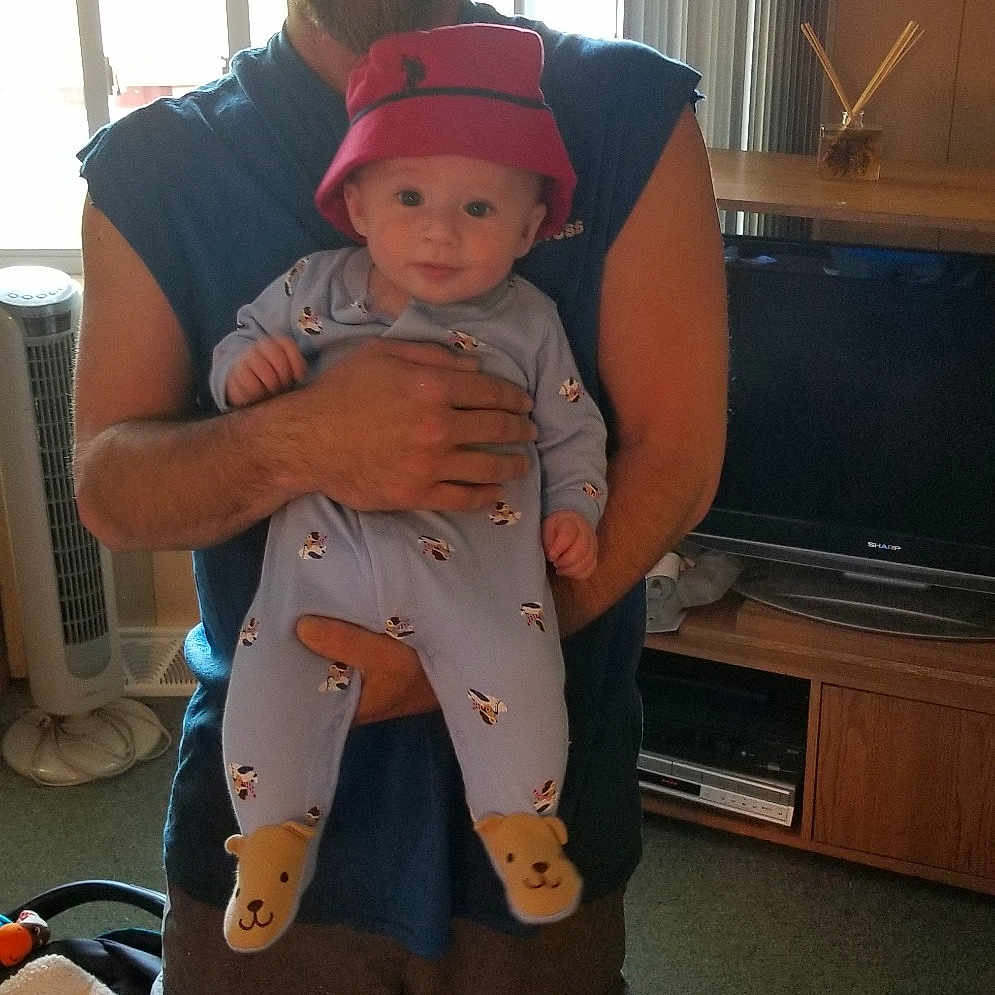 Geoffrey is registered to the contest to win money with this photo: arm, baby, baby_products, child, joy, person, product, shoulder, skin, standing, toddler