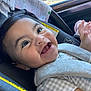 baby, child, car_seat, smile, happy, infant, clothing, seatbelt, closeup, portrait, indoor, cute, young_child, face, eyes, human, skin, sitting, baby_girl, toddler