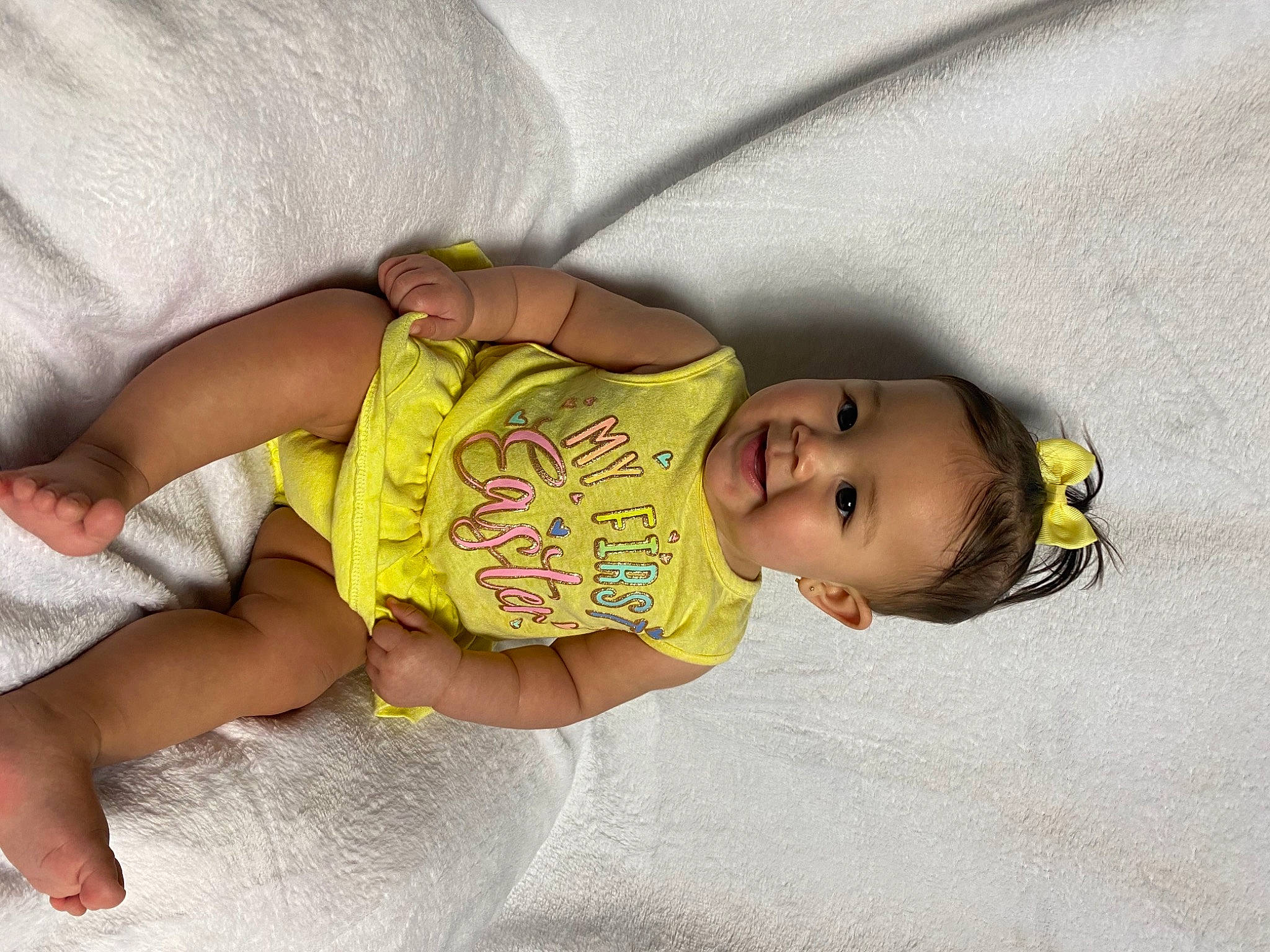 Katiana is registered to the contest to win money with this photo: arm, baby, baby_products, baby_safety, baby_toddler_clothing, cheek, child, comfort, eye, finger, hand, headgear, human_body, leg, linens, nose, person, product, skin, sleeve
