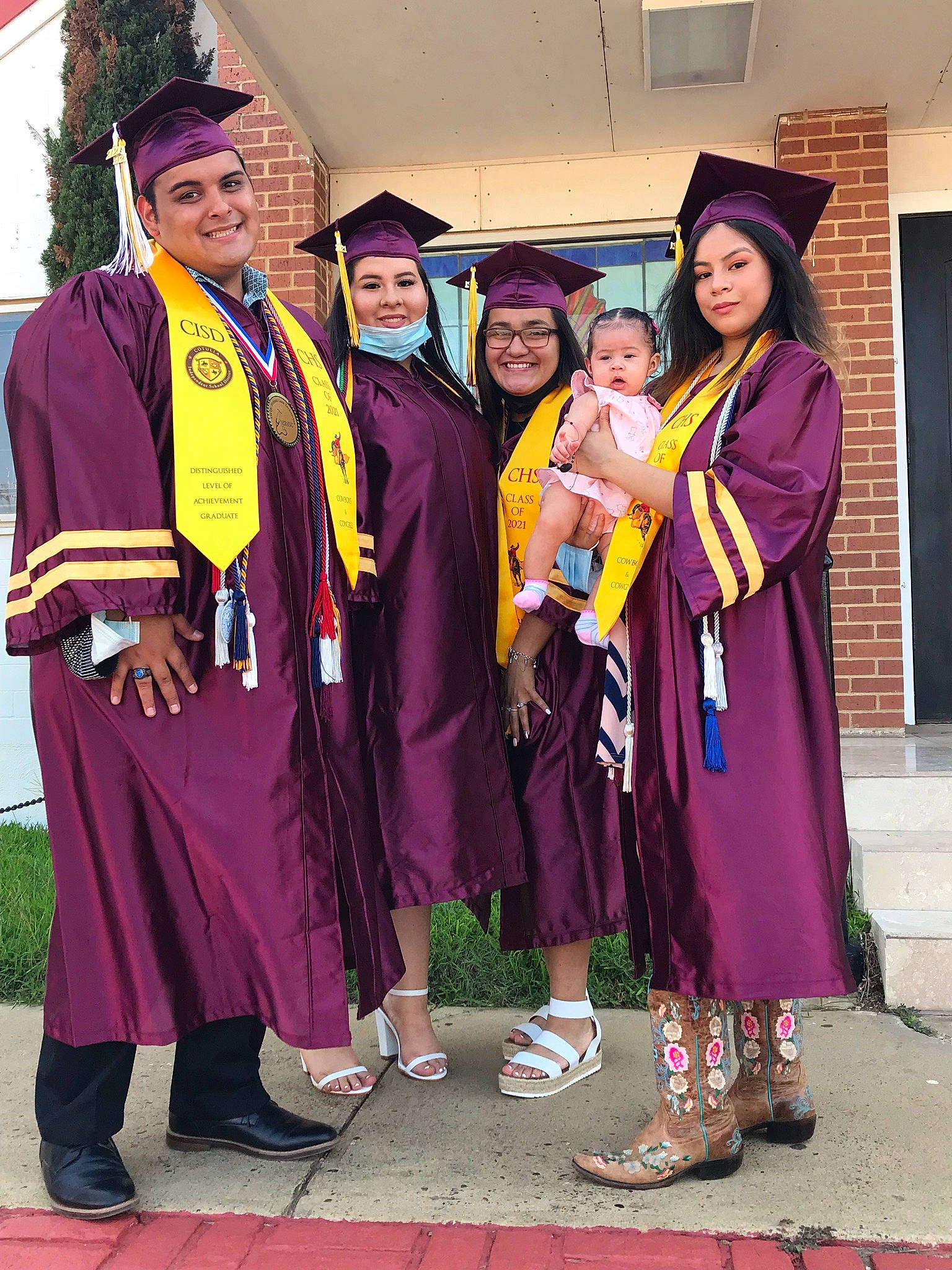 Annalisa joined the competition — help win amazing prizes! academic_dress, academic_institution, event, fun, graduation, hat, headgear, headwear, joy, magenta, mortarboard, person, phd, public_event, purple, sandal, scholar, smile, spring, tradition