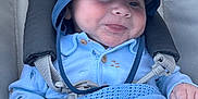 Jamie is registered to the contest to win money with this photo: baby, baby_face, baby_hand, blue_blanket, blue_hat, casual, cheeks, child, closeup, clothing, cute, fabric, happy, infant, knit_blanket, outdoor, portrait, seatbelt, smile, stroller