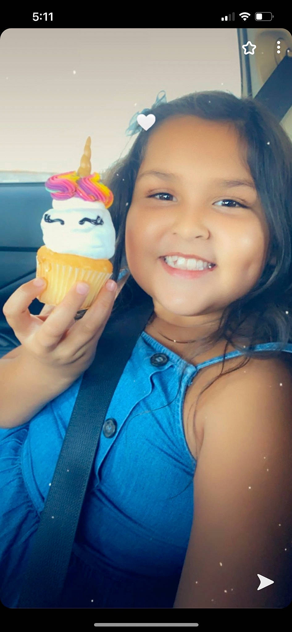 Emmy is registered to the contest to win money with this photo: blue, dairy, electric_blue, event, finger, food, frozen_dessert, fun, gelato, gesture, glove, hand, happy, ice_cream, ice_cream_cone, icing, joy, nail, person, smile
