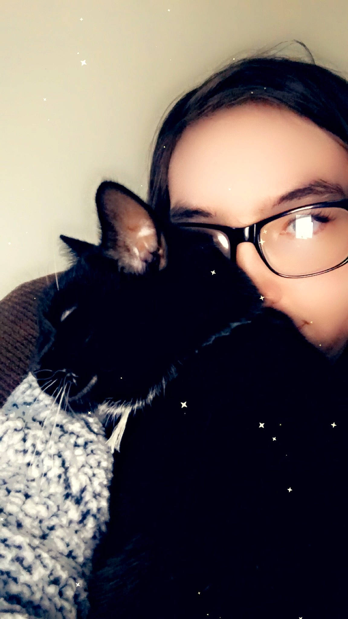 Lea is registered to the contest to win money with this photo: black_hair, carnivore, cat, comfort, ear, eye, eyewear, felidae, flash_photography, gesture, glasses, happy, iris, jaw, nose, small_to_medium_sized_cats, snout, tints_and_shades, vision_care, whiskers