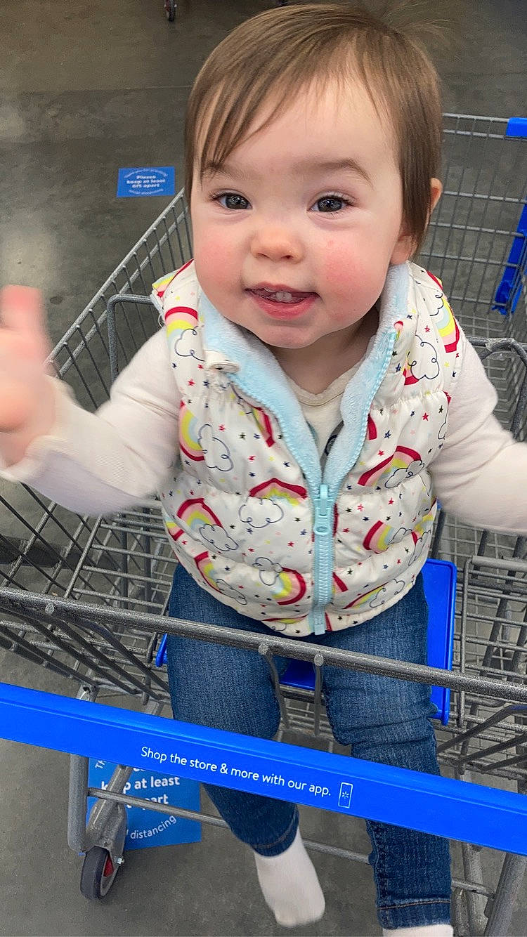 Aryah is registered to the contest to win money with this photo: baby, baby_safety, baby_toddler_clothing, cheek, child, eye, eyelash, iris, nose, person, product, service, shopping_cart, skin, toddler