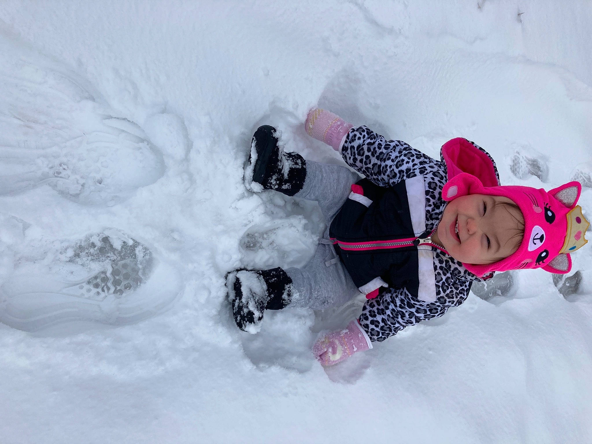 Aryah joined the competition — help win amazing prizes! baby_toddler_clothing, boot, cheek, costume_accessory, freezing, glacial_landform, glove, goggles, headgear, headwear, ice_cap, joy, person, play, playing_in_the_snow, precipitation, sledding, snow, snow_boot, winter