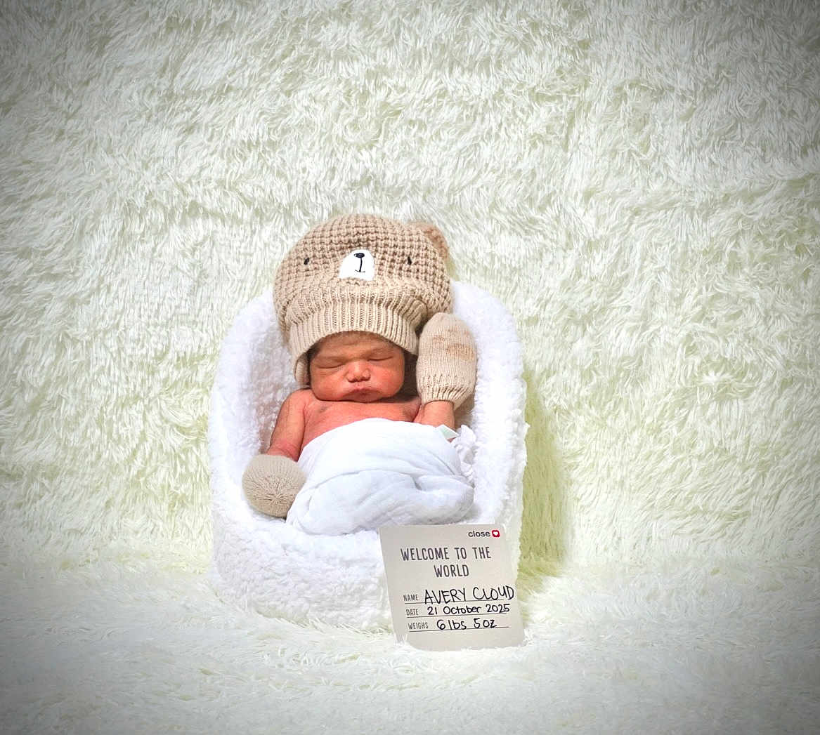 Avery joined the competition — help win amazing prizes! newborn, baby, sleeping, knitted_hat, mittens, basket, white_background, soft_texture, fluffy, welcome_card, portrait, cute, infant, cozy, baby_clothing, peaceful, child, studio_photo, warm, resting
