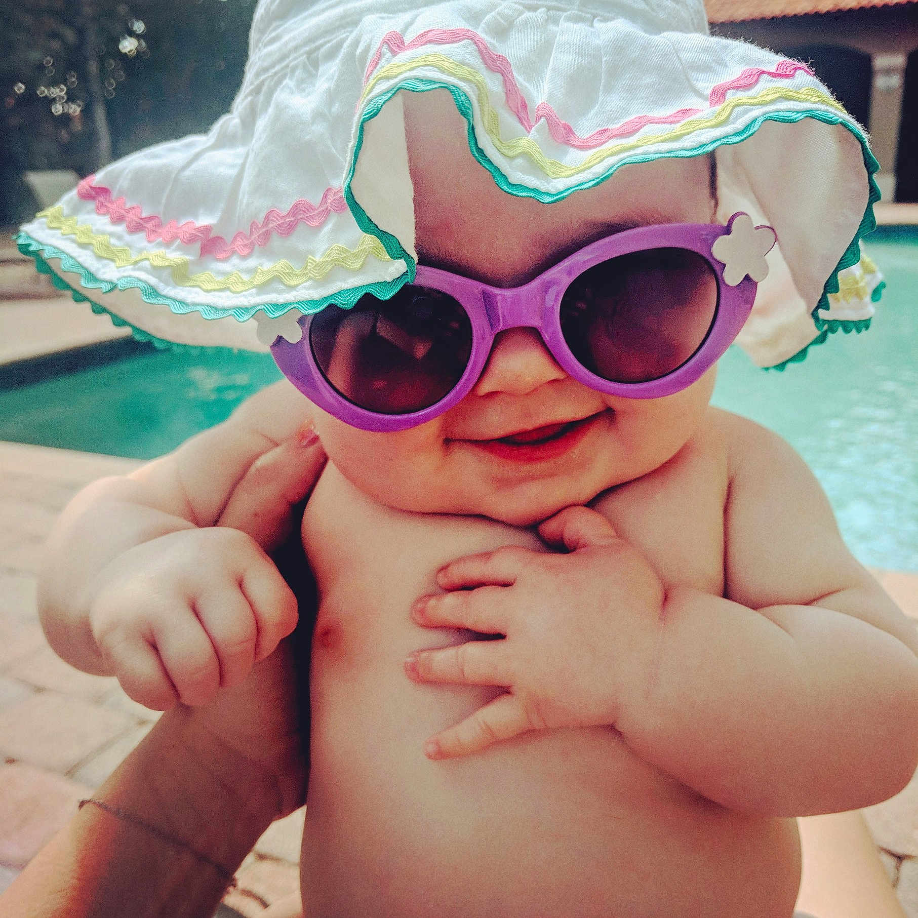 Cecilia joined the competition — help win amazing prizes! cheek, child, cool, eyewear, finger, fun, girl, glasses, hand, headgear, infant, product, skin, smile, sunglasses, toddler, vision_care