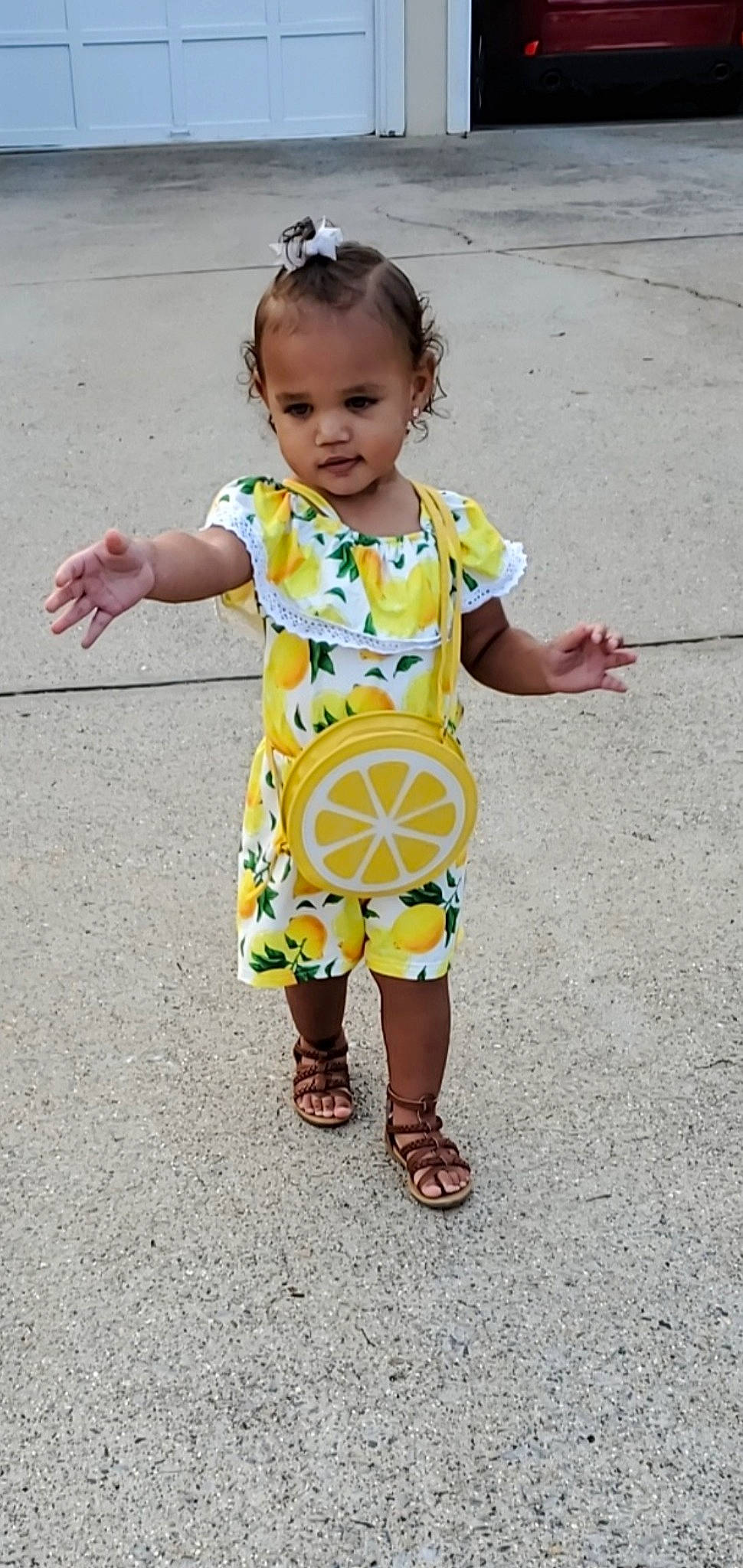 Kaiya is registered to the contest to win money with this photo: baby, baby_toddler_clothing, child, design, footwear, pattern, person, play, sleeve, smile, toddler, yellow