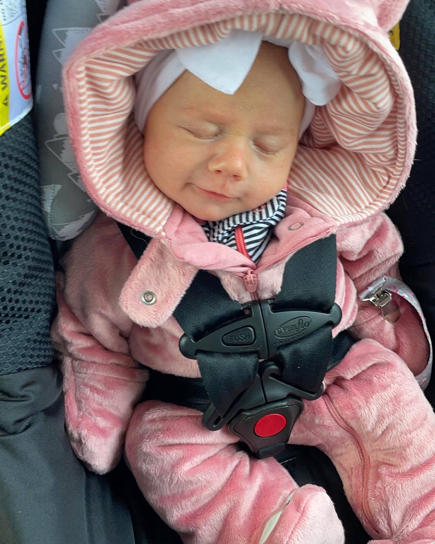 Avalon joined the competition — help win amazing prizes! baby, baby_carriage, baby_products, baby_toddler_clothing, cameras_optics, cap, child, fashion_accessory, finger, gesture, hand, happy, headwear, magenta, nail, person, pink, skin, sleeve, smile