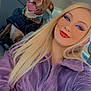 Willow joined the competition — help win amazing prizes! woman, dog, car_interior, selfie, smiling, blonde_hair, purple_jacket, pet, happy, tongue_out, seat, collar, casual, portrait, makeup, indoor, furry, animal, friendship, travel