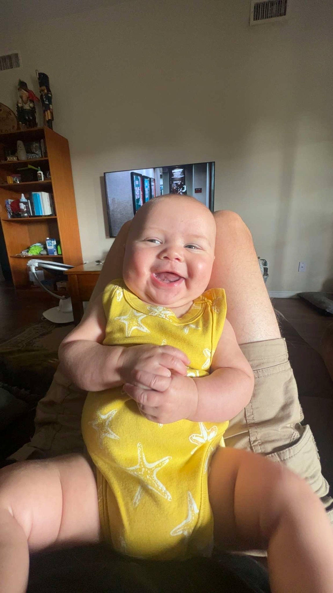 Jasper joined the competition — help win amazing prizes! abdomen, baby, baby_laughing, baby_toddler_clothing, bookcase, chair, cheek, chest, comfort, gesture, happy, iris, knee, person, picture_frame, shelf, smile, thigh, thumb, toddler