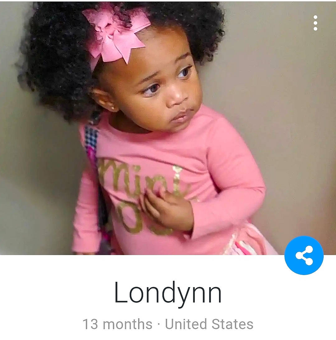 Londynn is registered to the contest to win money with this photo: arm, baby_toddler_clothing, beauty, black_hair, cheek, eyebrow, eyelash, forehead, gesture, hair, happy, magenta, neck, nose, person, pink, product, skin, sleeve, toddler