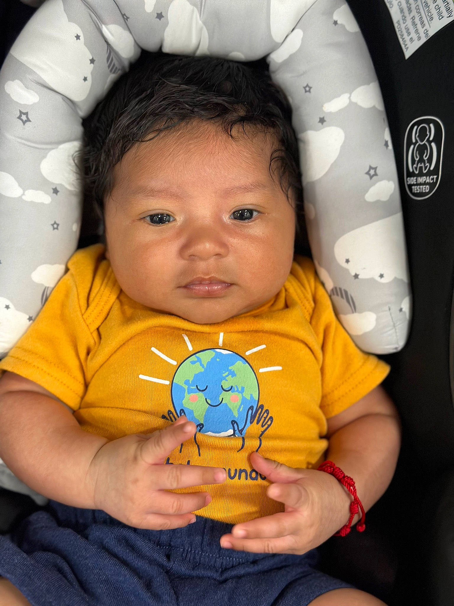 Davian is registered to the contest to win money with this photo: baby, baby_toddler_clothing, cheek, child, chin, comfort, finger, fun, gesture, hand, happy, head, mouth, nose, person, play, skin, sleeve, t_shirt, toddler