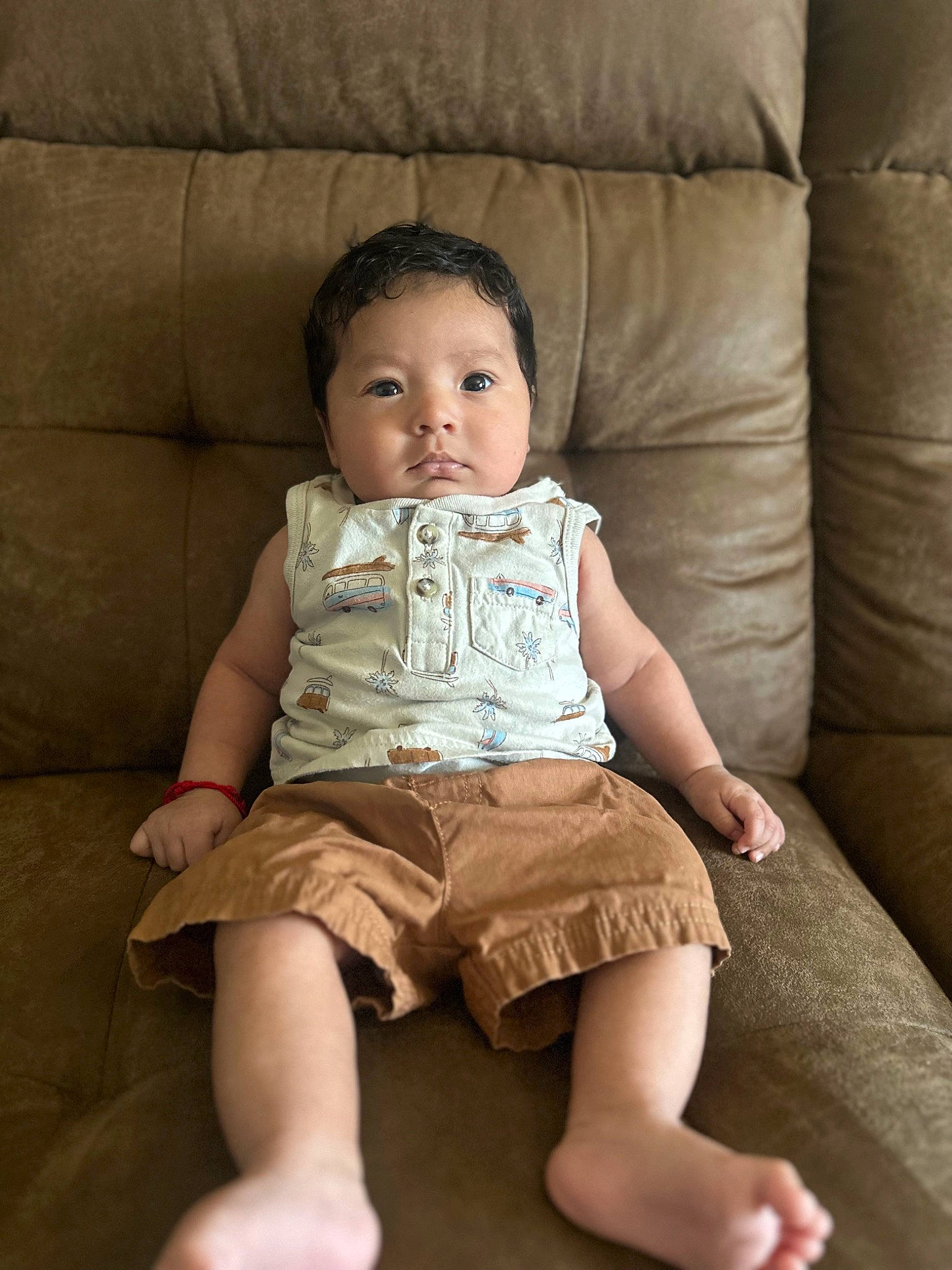 Davian is registered to the contest to win money with this photo: baby, baby_toddler_clothing, cheek, child, comfort, couch, finger, flash_photography, human_leg, joint, knee, organ, people, person, sitting, skin, sleeve, textile, thigh, toddler