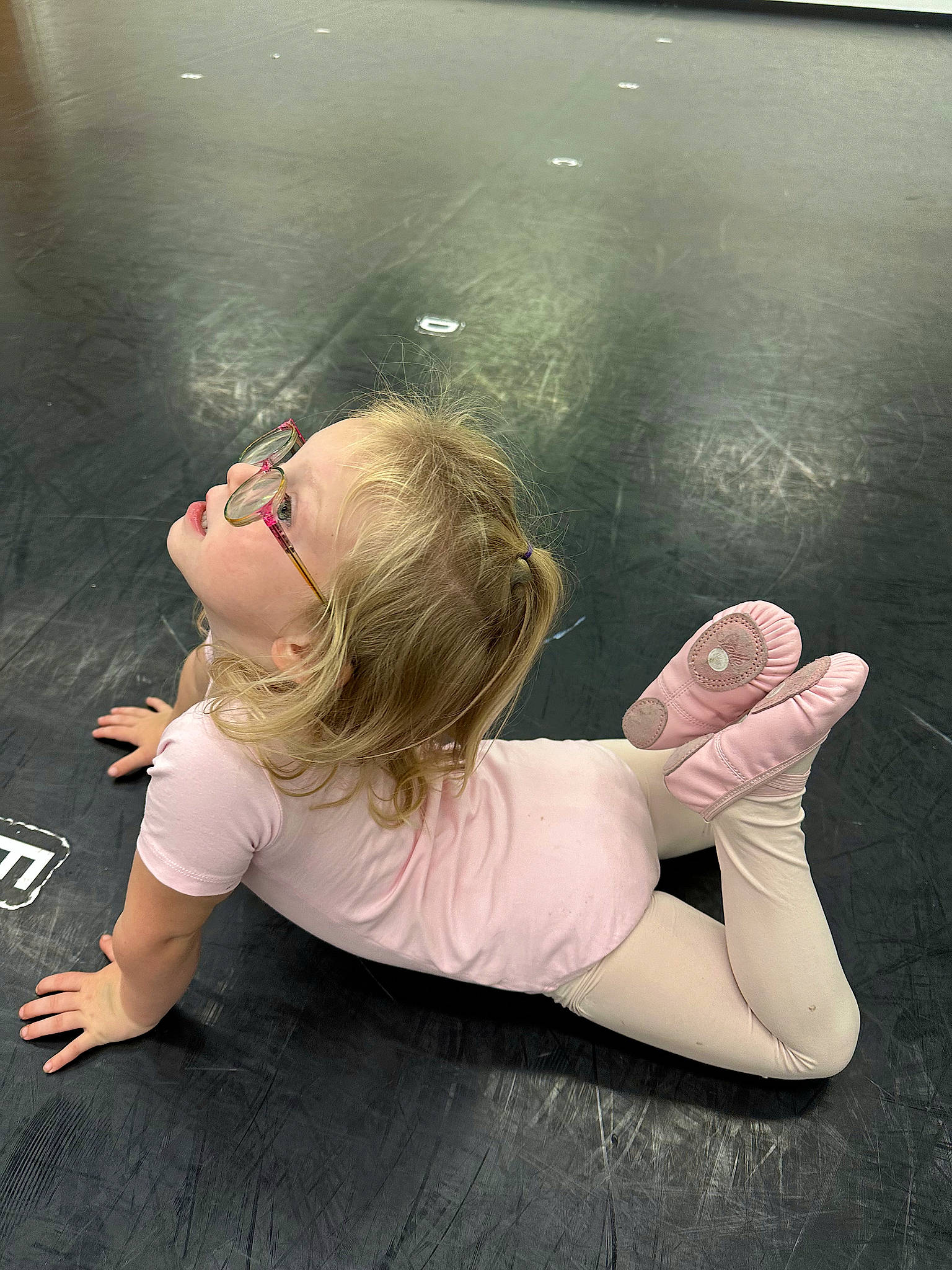 Mckenzie joined the competition — help win amazing prizes! arm, asphalt, elbow, entertainment, finger, flash_photography, floor, flooring, hand, happy, human_body, joint, knee, leg, performing_arts, person, pink, shoe, shoulder, sneakers