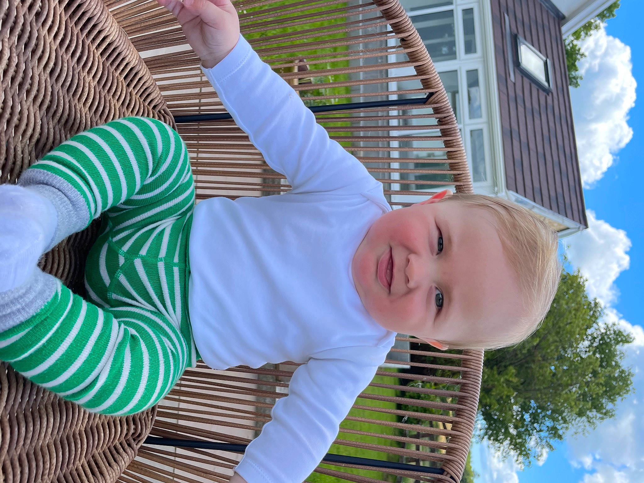 Haydn is registered to the contest to win money with this photo: child, cloud, fun, grass, green, happy, joint, leisure, line, pattern, person, photograph, plant, sky, sleeve, smile, t_shirt, textile, tree, white