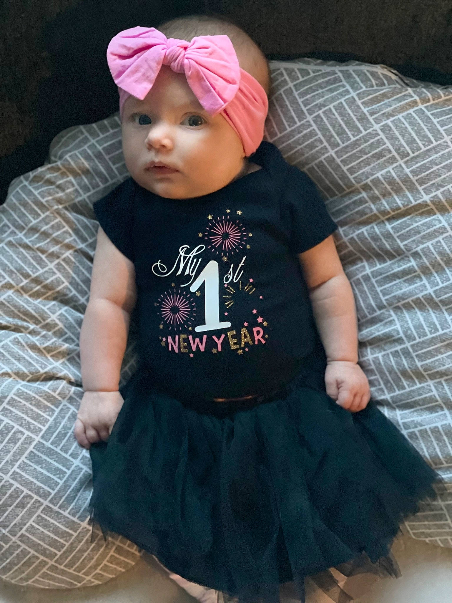 Lincoln is registered to the contest to win money with this photo: baby, baby_products, baby_toddler_clothing, baseball_cap, cap, child, costume_hat, day_dress, face, fashion_accessory, glasses, headgear, headwear, knit_cap, magenta, pattern, person, pink, sitting, sleeve