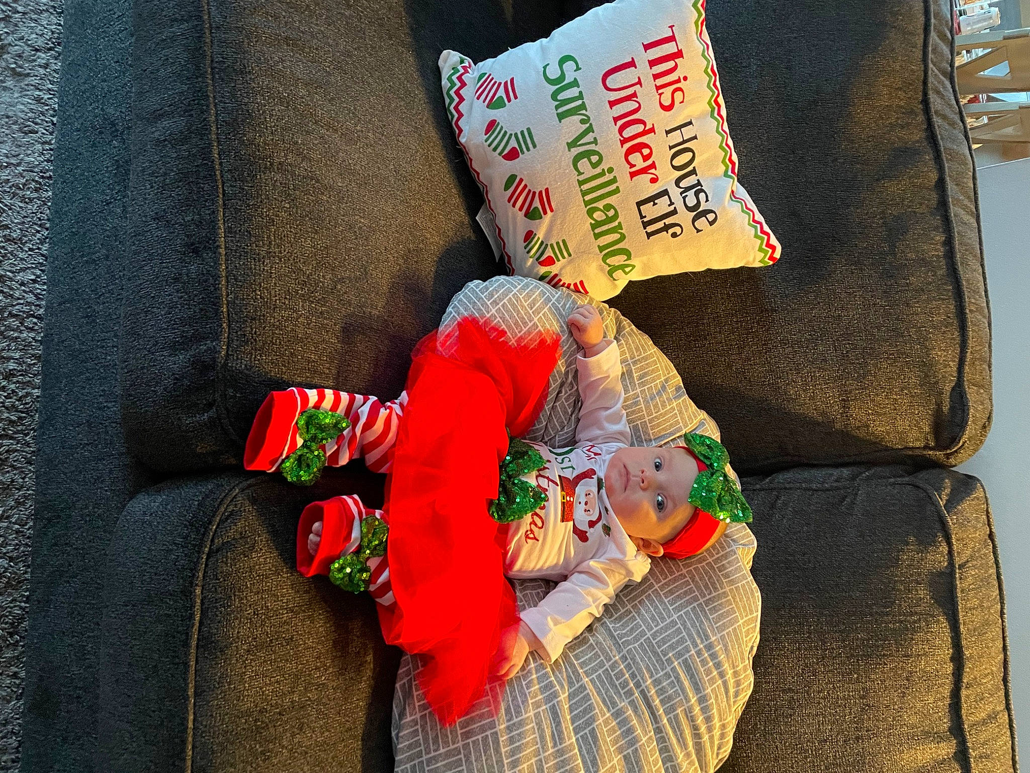 Lincoln is registered to the contest to win money with this photo: baby, baby_products, baby_toddler_clothing, carmine, comfort, headwear, linens, nap, pattern, person, room, sleeve, stuffed_toy, throw_pillow, toddler, wool