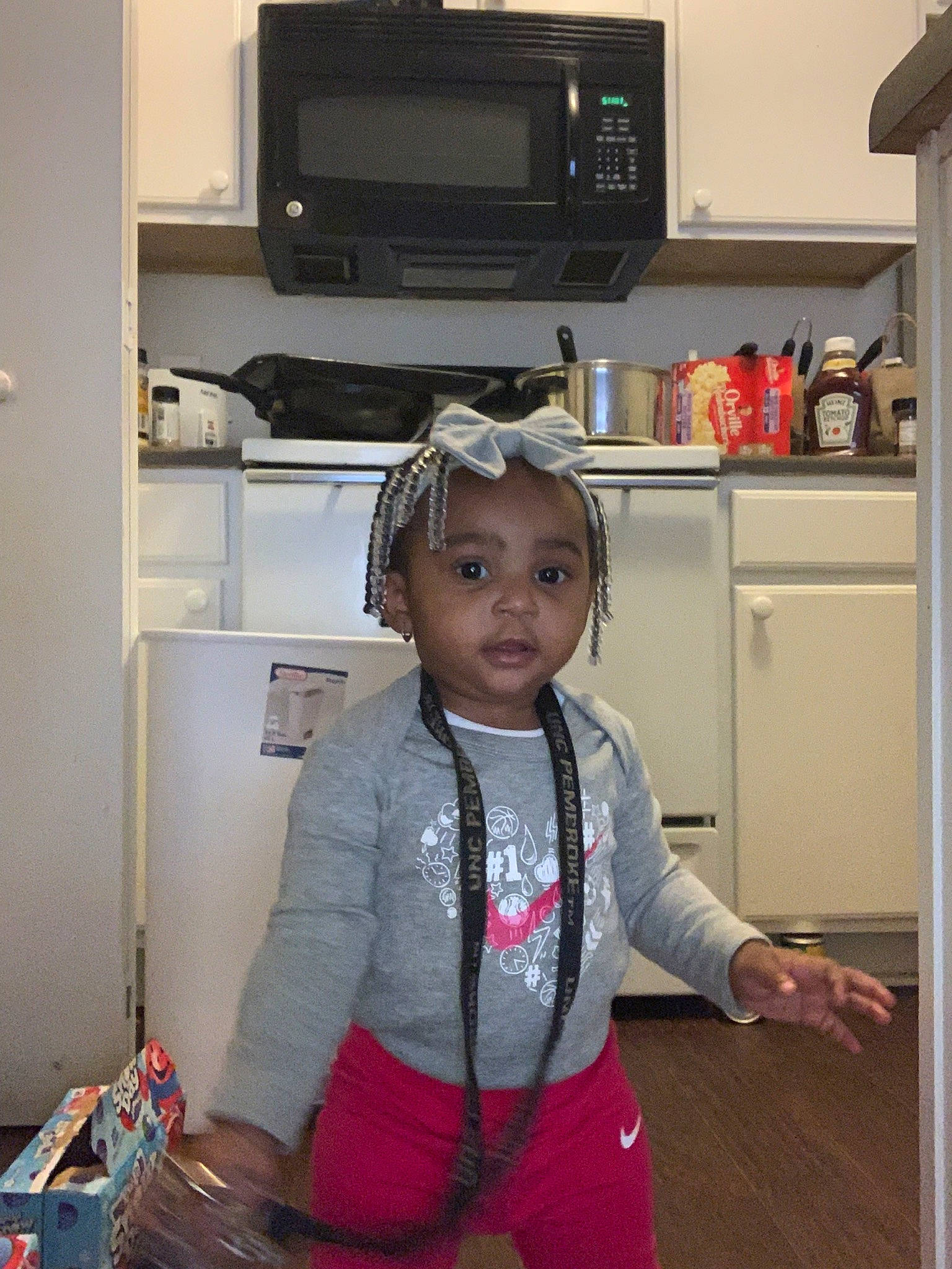 Amia joined the competition — help win amazing prizes! child, electronics, home, house, kitchen, media, microwave_oven, person, play, room, standing, t_shirt, toddler