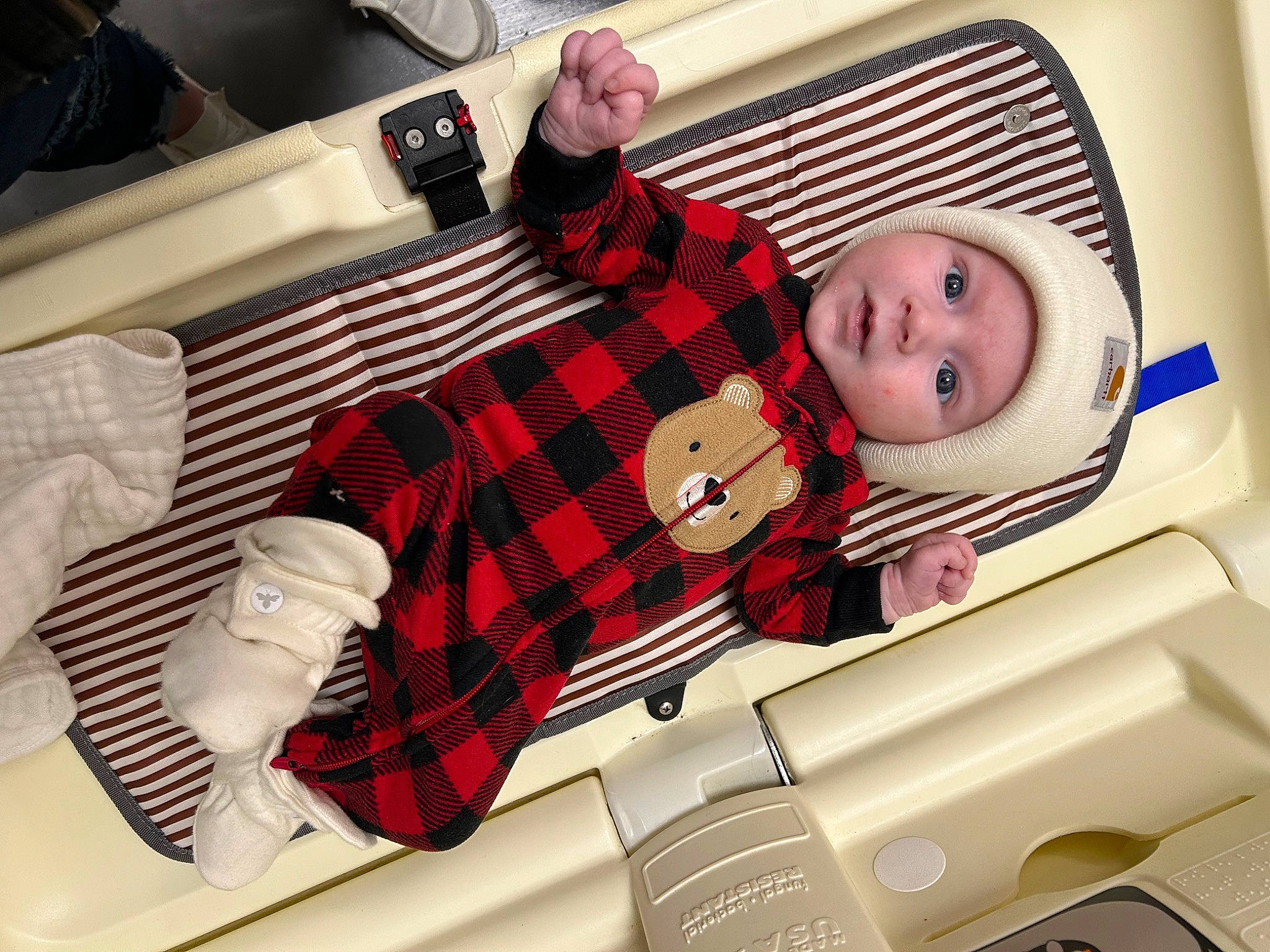 Lucien is registered to the contest to win money with this photo: baby, baby_products, baby_safety, baby_toddler_clothing, bag, carmine, child, comfort, gadget, headwear, linens, luggage_and_bags, motor_vehicle, pattern, person, plaid, room, tartan, toddler, toy